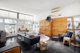 Large sitting room, which is adorned with sculptured custom cabinetry by local Perth designer and furniture maker Adam Cruickshank. 