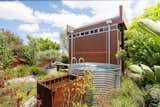 Stainless stockman pool in an established native garden. 