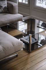 Historical guardrails reflected by the Colombo glass coffee table