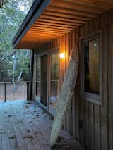 The board and batten cedar siding adds texture and warmth 