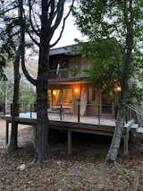 The existing house was extend at the back, with the addition of a bedroom on the lower floor, and a new rear deck 