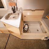 Convertible shower and toilet designed to maximize space usage 04