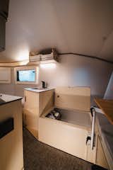 Convertible shower and toilet designed to maximize space usage 02