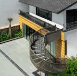 View of staircase connecting to gym.