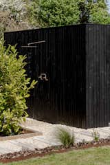 Outdoor shower areas offer a cool and practical solution for swimmers.