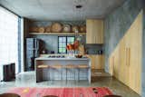 Kitchen with Custom made Pantry Doors; Pantry using space under staircase, Tanzanian Decorative Woven Plates, Morroccan Taznakht Runner, Moroccan Cactus Rug 