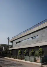 Courtyard-centric plan with axial symmetry; framed views and clean geometry emphasize spatial clarity.