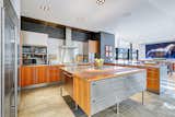 Custom German Kitchen and Dining Room Beyond