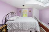 the lavender bedroom with skylight for a dreamy night