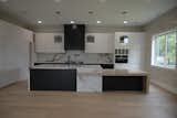 Custom cabinetry and venetian plaster walls