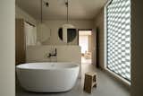 The open-concept bathroom