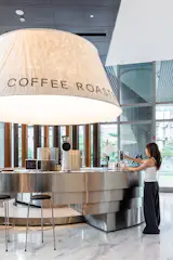 The bar's rhythmic joint lines highlight seamless modular integration.