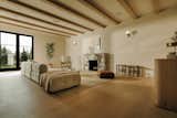 One of our favorite spaces in the home. The fireplace is a honed viola marble. Walls and ceiling beams are oak. Walls are plastered using Meoded. 