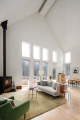 Soaring 3-ft cathedral ceilings add a touch of drama to the living spaces.