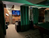 Our 65" screen, electric fireplace, and privacy curtains make for cozy movie nights. 