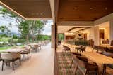Inhabiting Hoyo 19 is experiencing golf through an interior design that outlines the warmth of a characteristic space evoking the classic aesthetic associated with the sport.