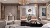 Immerse yourself in the refined elegance of this luxury living room interior, where contemporary design meets timeless sophistication. This space is a perfect fusion of rich textures, soft curves, and a warm, neutral color palette, creating an ambiance of effortless luxury.
The statement arched wall panels, backlit for a soft glow, serve as a breathtaking focal point, adding depth and artistry to the room. Plush seating in pastel and deep blue tones offers both comfort and style, while a sleek black coffee table anchors the space with modern contrast. The embossed feature wall, adorned with intricate detailing, enhances the grandeur, making every corner a visual delight.
A stunning chandelier adds a touch of opulence, reflecting light beautifully across the high-gloss marble flooring. Elegant drapery and curated décor complete the look, striking a balance between modern aesthetics and classic charm.
This luxury interior design is a testament to fine craftsmanship and attention to detail—designed for those who appreciate sophistication in every element of their home.