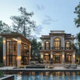 This stunning turnkey villa exemplifies the fusion of classical elegance and contemporary living. Featuring a grand façade with arched windows, ornamental ironwork balconies, and symmetrical design, the residence evokes timeless sophistication. Floor-to-ceiling glass elements allow for seamless indoor-outdoor living and fill the space with natural light. A separate glass-walled pavilion complements the main structure, perfect for entertaining or as a serene retreat. The outdoor area includes a pristine pool, modern lounge seating, and ambient lighting—offering a resort-style experience right at home. This is turnkey luxury redefined—beautifully efficient and impeccably curated.

