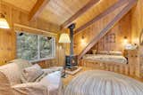 The open, wood-lined loft was one of Dolly’s favorite creative spaces. It features sleeping nooks, reading areas, and charming collected décor.