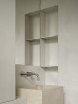 Bathroom with bespoke travertine sink