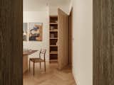 Travertine archway to enter in the kitchen-dining area