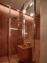 Red travertine guest loo
