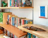 Detail of locally sourced wood bookshelf designed and crafted by clients