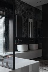 one of the bathrooms in the master block