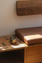 After: The dining nook has become one of the sunniest spots in the house, gathering light from morning through late afternoon.