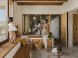 Designed to evolve with the family, the multipurpose room shifts between home office, playroom, workshop space, and gathering area.