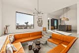 Custom designed conversation pit with art curated by owner Nick Battisto