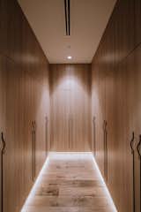 New walk in robes with floor to ceiling storage and LED strip lighting.