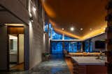 The stone double-decker, containing four bedrooms, mingles with the living+dining open sala. 