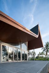 The beachfront balcony on an elevated stone plinth.