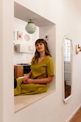 Nina Savič, the founder of Jugošik Studio and the creative mind behind both the design and personal story of the flat.