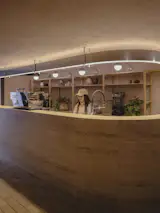 The ordering bar highlights the use of marble and integrated lighting fixtures.