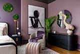 Sculptural decor and rounded furniture bring softness and strength into balance, anchoring the space with symbolic beauty.