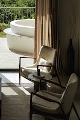Drawing Room-Seamlessly opening to a terrace garden, the formal living area invites the outdoors in — a warm embrace of light, texture, and tranquility