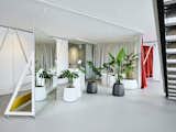 The freestanding bathroom furnishings can be transformed into a private bathroom by drawing the curtains, offering an adjustable level of intimacy.