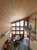 This is the view from the top of the stairs. You can also see the walkway that leads to the half-bathroom.