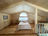 Here is the loft that is being used by the client as an additional sleeping suite. The natural beauty of mass timber eliminates the need for paint. 