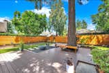 Backyard -New cedar fence with PVC decking 