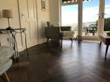 Karndean Van Gogh Salvaged Barn Wood in a herringbone pattern