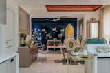 Living and dinning area showcasing the royalty with a touch of pitch via art