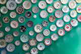The client wanted to display her collection of Romanian plates in the kitchen, but also needed ample storage. Rather than choosing between the two, I let the plates take flight. Suspended from the ceiling in a solution that’s practical, personal, and playful