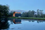 Located on a rural family farm near Cayambe, Ecuador, this off-grid prefabricated retreat is designed specifically for short stays.