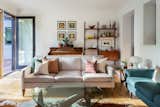 Family Room with Piano, Couches, and Shelves