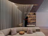 A second sofa setting offers a calm, relaxed retreat area