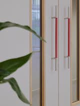 Double doors featuring Sembla handels with a deep red Ultrafabrics grip